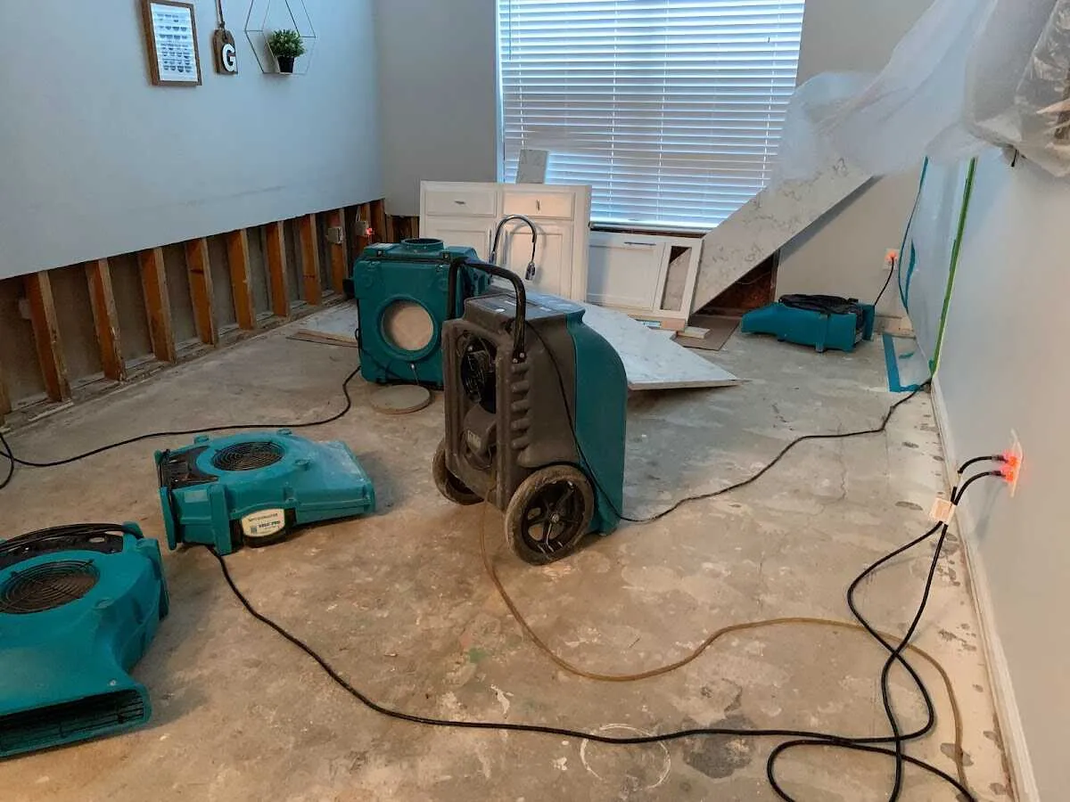Dehumidifier in flood-cut room for Water Damage Restoration in St. Gabriel